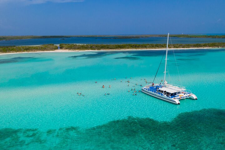 A snorkeller in shallow clear water at El Cielo, Cozumel