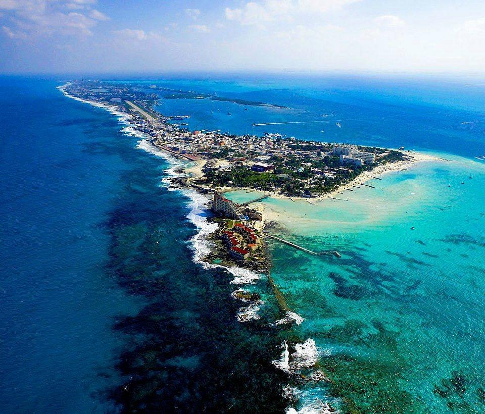 Aerial view of Isla Mujeres and Playa Norte, with clear turquoise Caribbean water off the Mexican coast
